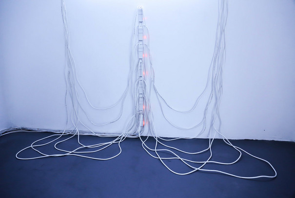 Installation with cables by Romily Alice Walden.