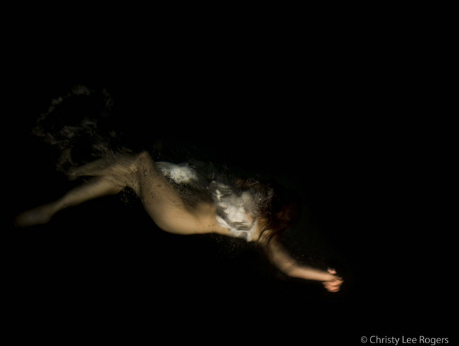 Photo for the symposium [ OBSCENE ]. A floating female body.